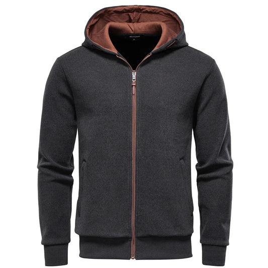 Dark gray hoodie with brown zipper and lining on a white background