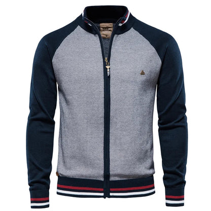 Gray and navy jacket with a brand logo on a white background