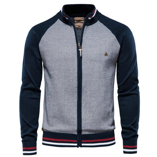 Gray and navy jacket with a brand logo on a white background